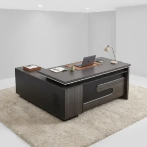 Modern Executive 1.6m Desk with dark wood-grain finish, spacious layered worktop, raised rear surface, integrated enclosed storage, broad panel-style structure and recessed metallic-toned front detail