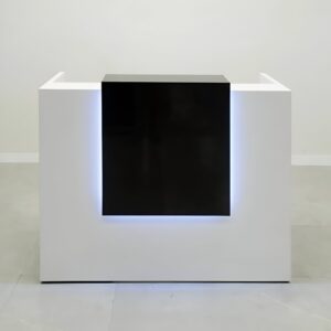 1.8M Modern Reception Desk with white geometric exterior, large black rectangular front panel, illuminated accent and raised side sections