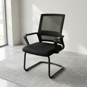 Modern Mesh Visitor Chair with black mesh backrest, padded black seat, integrated open armrests and continuous black sled-style frame