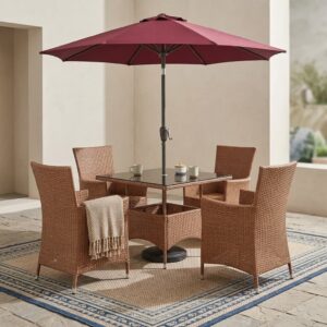 Outdoor Dining Set with Shade Umbrella showcasing a square brown poly-rattan wicker table with a tempered glass top, four matching woven armchairs, and a large rust-red patio umbrella.