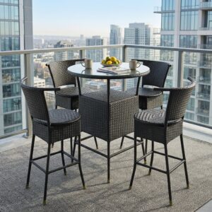 Berlin Luxury Outdoor Bar Set showcasing a high-top round table with a tempered glass top and four matching high-back bar stools crafted from woven black poly-rattan wicker on a stone tile patio.