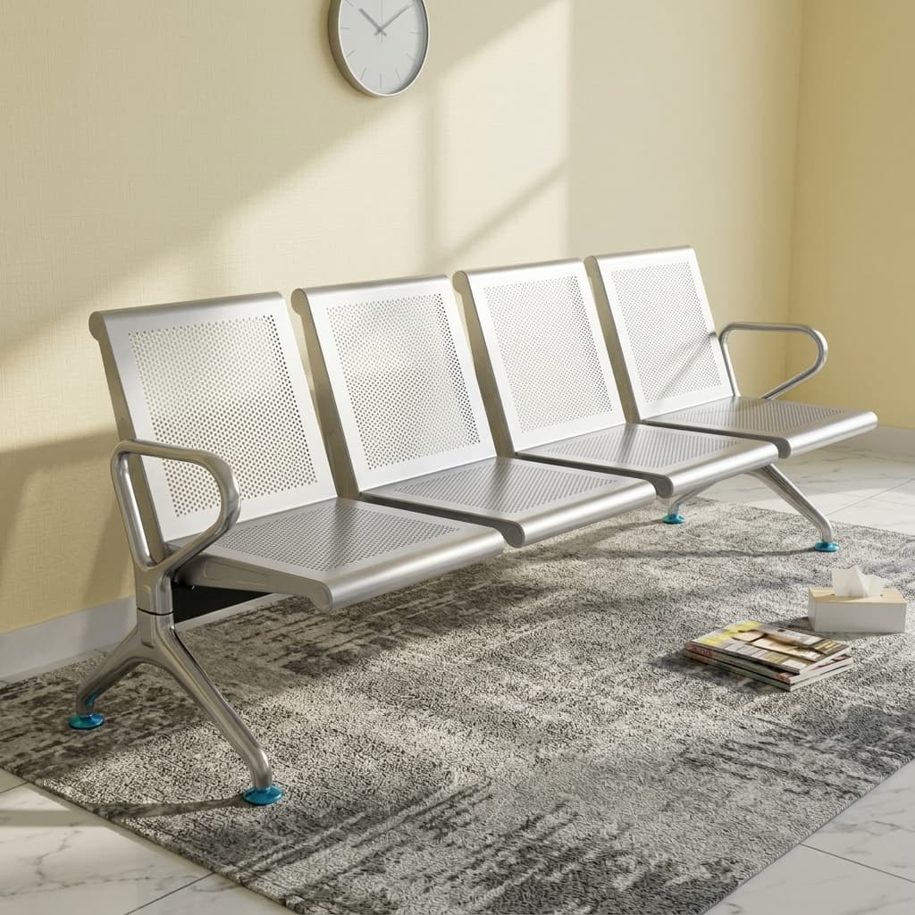 Heavy Duty 4 Seater Waiting Bench Showcasing A Four-Seat Row Made From Micro-Perforated Metallic Silver Stainless Steel Panels With Integrated Steel End Armrests.