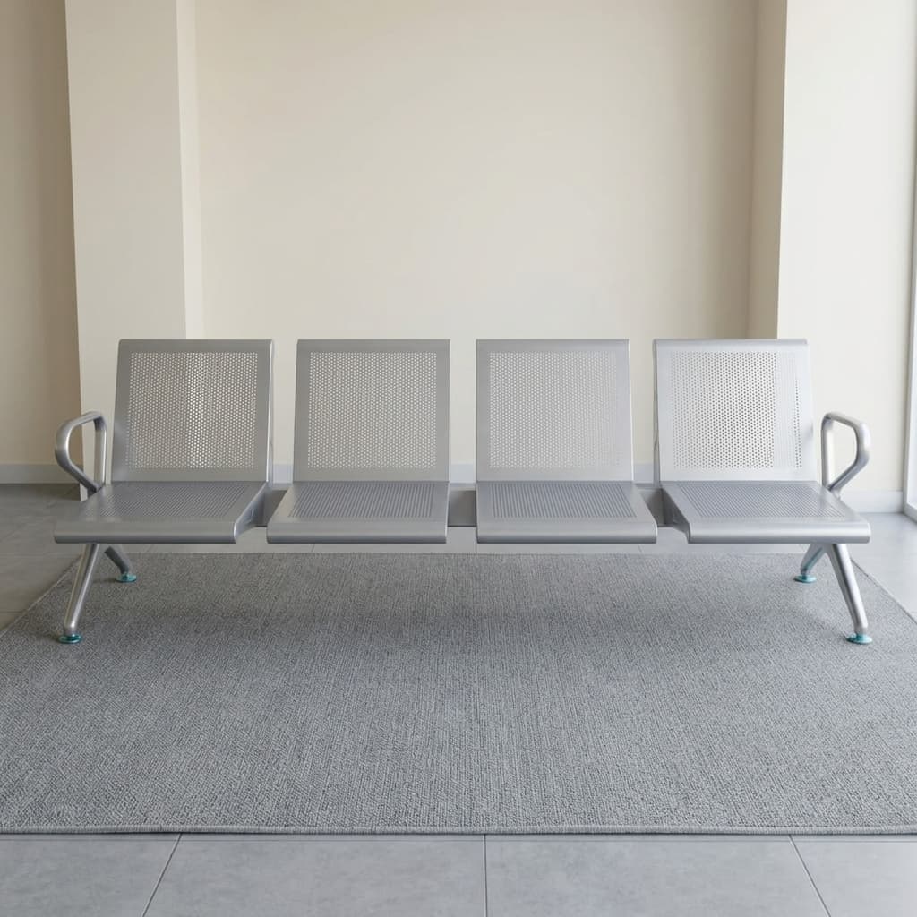 Heavy Duty 4 Seater Waiting Bench Showcasing A Four-Seat Row Made From Micro-Perforated Metallic Silver Stainless Steel Panels With Integrated Steel End Armrests.