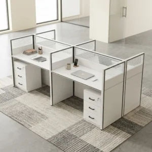 Premium 4-Person Workstation showcasing a four-desk modular cluster with white laminate surfaces, black metal trim, fluted glass privacy screens, and four matching under-desk filing drawers.