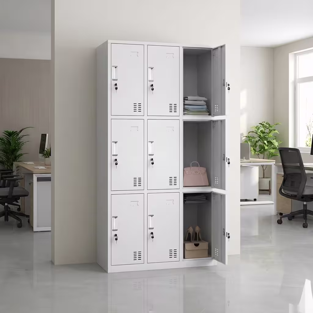 9-Compartment Steel Personnel Locker - Light Grey Multi-Tier Metal Storage Cabinet With Individual Keyed Locks And Ventilated Doors In A Modern Interior Setting.