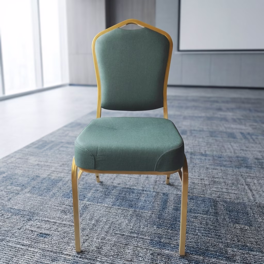 Deluxe Banquet Chair With Gold Metal Frame And Green Upholstered Seat Designed For Hotels, Conference Halls, And Event Venues.