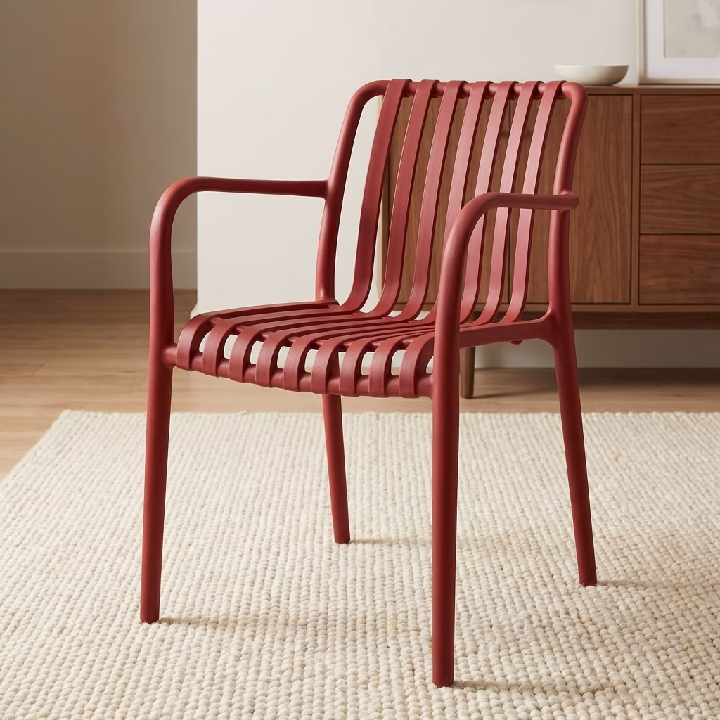 Stylish Plastic Armchair Made From Solid Plastic With Slatted Design And Armrests
