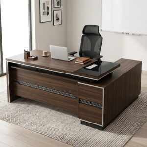 Prestige Executive Office Desk showing a 1.8-meter L-shaped wooden executive workstation with dark wood grain veneer, charcoal gray side credenza, and a black desk blotter inlay in a high-rise office.