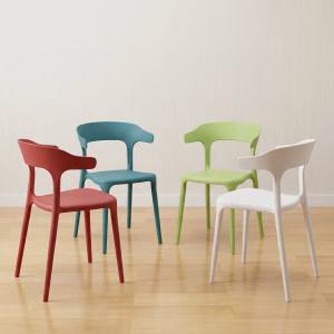 Modern Plastic Dining Chair in multiple contemporary colors with molded design in a clean dining space