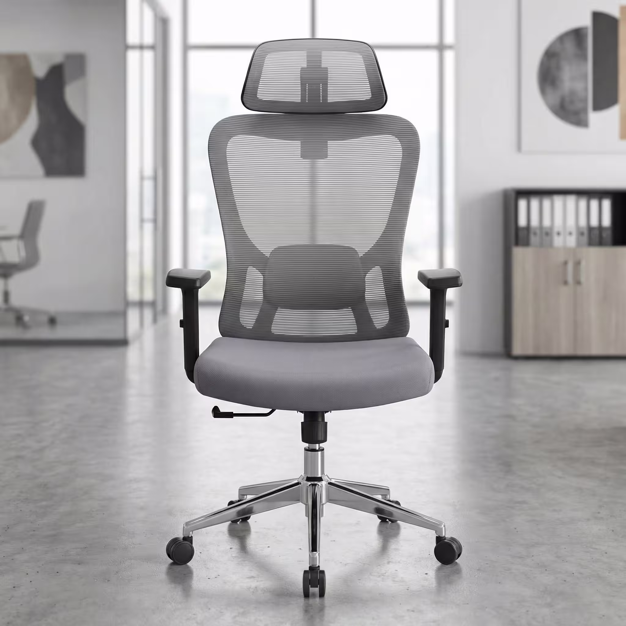 Ergonomic Mesh Office Chair with adjustable headrest, lumbar support, reclining function, and swivel base in a modern office setting