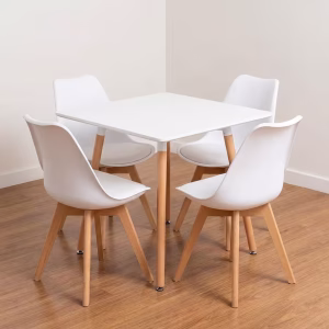 Modern 4-Seater Dining Set with white table and molded chairs featuring solid wooden legs in a contemporary dining space