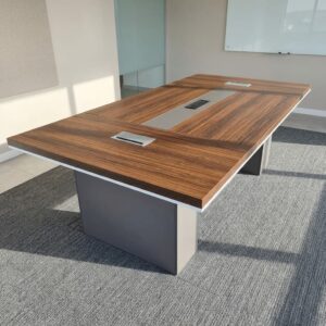 A rectangular Premium 2m Wooden Boardroom Table featuring a wood grain laminate surface, white edge banding, multiple silver power flip-covers, and thick block pedestal legs.