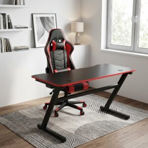 A Red Black Gaming Set Featuring A Black Carbon Fiber Textured Z-Leg Desk With Red Edges And A Matching Black And Red Leatherette Ergonomic High-Back Racing Chair.