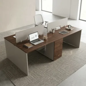 Modular four-person Commercial 4-Way Multi-Desk Workstation featuring a walnut desktop, light-gray privacy divider screens, integrated white power grommets, and a lockable drawer unit.