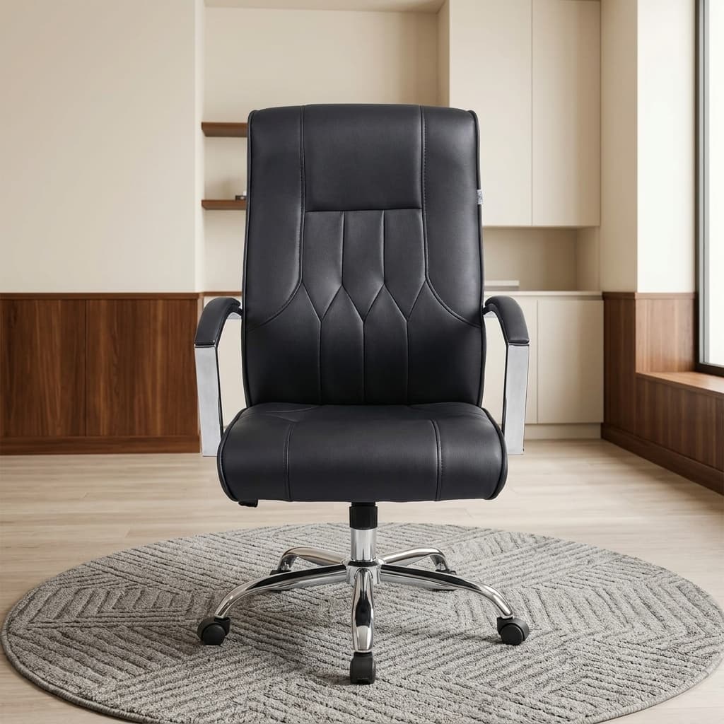 High-Back Executive Leather Office Chair With Black Leather Upholstery, Padded High Backrest, Stitched Lumbar Detailing, Cushioned Seat, Curved Padded Armrests, Chrome Five-Star Base, And Black Castor Wheels.