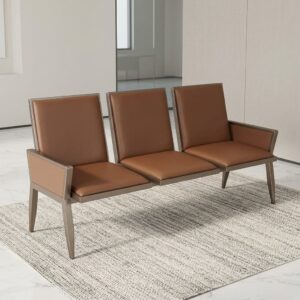 3-Seater Leather Waiting Bench showcasing three smooth caramel brown leatherette seats with matching upholstered armrests built onto a champagne-gold metal frame.