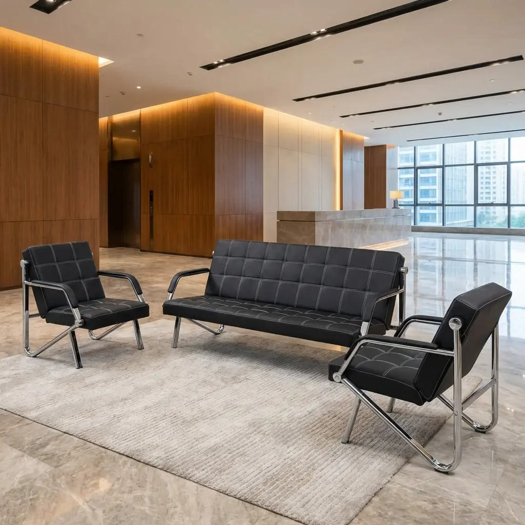 3+1+1 Executive Reception Sofa Set With Black Upholstered Three-Seater Sofa And Two Matching Single Armchairs, Square Stitched Panels, Chrome-Toned Tubular Frames And Padded Arm Sections
